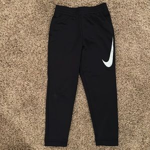Youth Nike Large Fleece lined joggers.